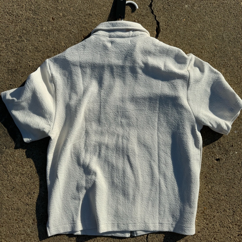 Novamen white/cream zipper collared shirt.
